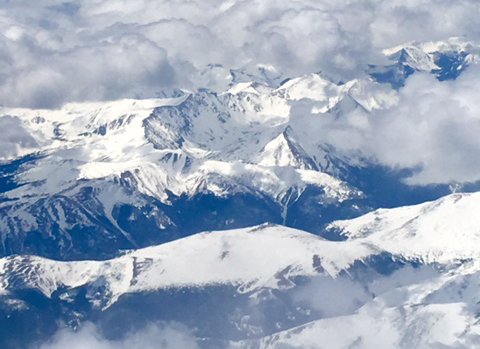 Billowy clouds move across the snow covered San Juan Mountains, making for a beautiful backdrop for the 2017 Mountainfilm Festival and a great reminder of the power of nature to inspire people to action. Telluride, Colo., May 2017. Photo: Francesca Rehnborg