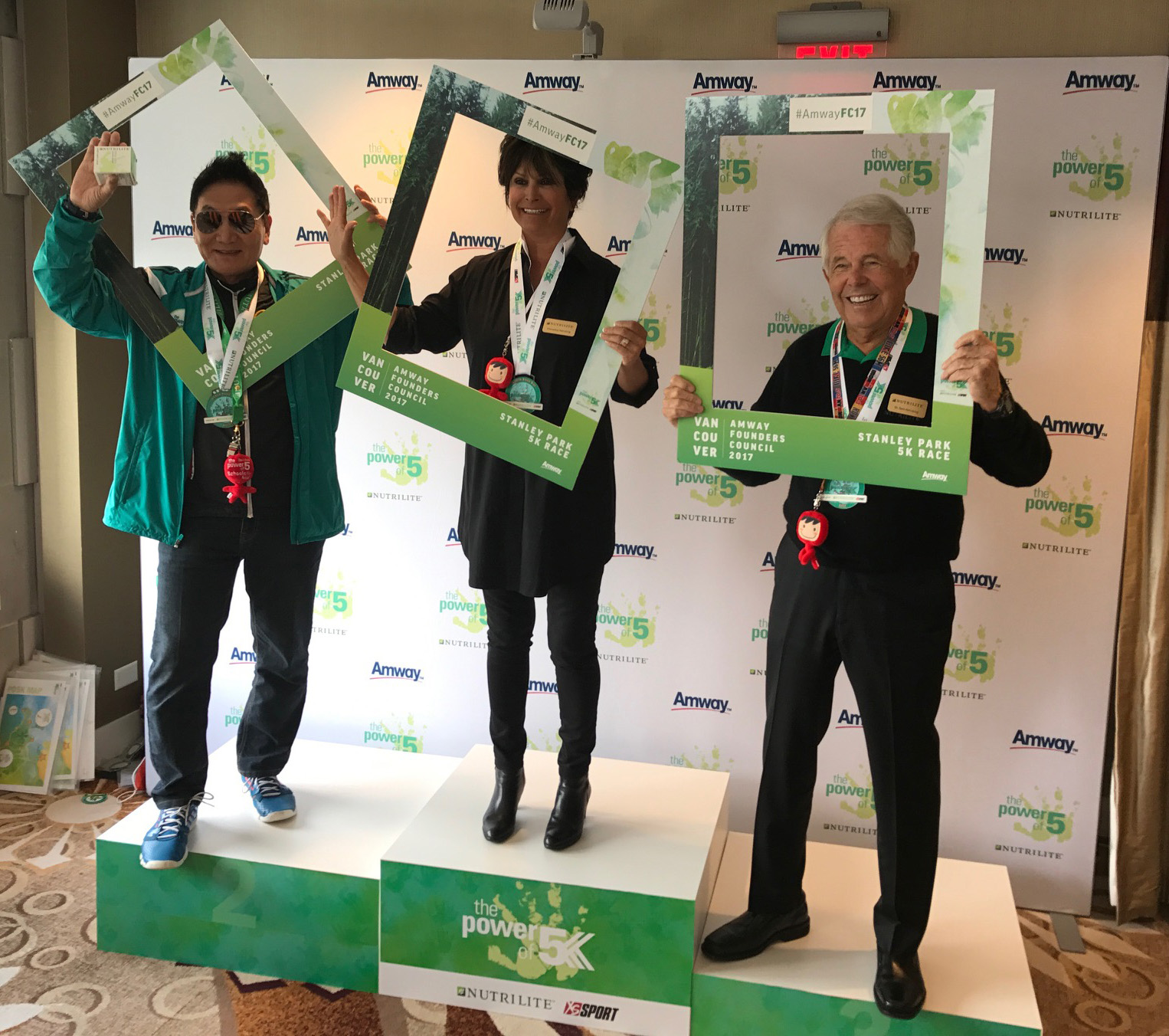 Francesca and I join Leonard Kim on the podium with our Power of 5 frames. Leonard has been, and continues to be, an inspiration in helping children (and adults) live better lives. Vancouver, Canada. May 2017. Photo: Joel Van Kuiken