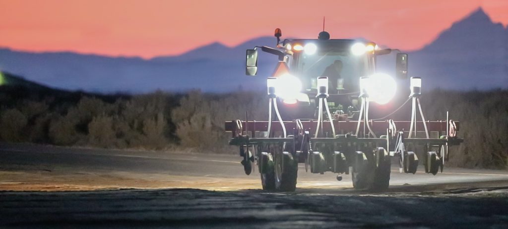 GPS tractor planting echinacea at the end of a long day. Echinacea is a crop destined for Nutrilite™ Immunity Echinacea. Trout Lake Farm East, Wash., March 26, 2020. Photo: Darwin Hintz.