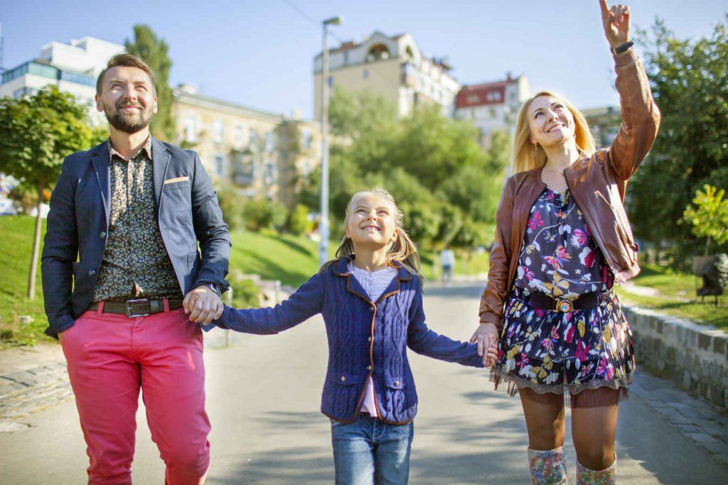 Family taking a walk. Healthy aging is associated with an optimal activity level (at least 2.5 hours of moderate activity or at least 1.25 hours of vigorous activity each week).