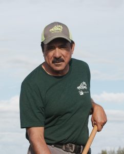 Jose Aguinaga working in a field at Trout Lake Farm East. Ephrata, Wash, June 2020. Photo: Darwin Hintz
