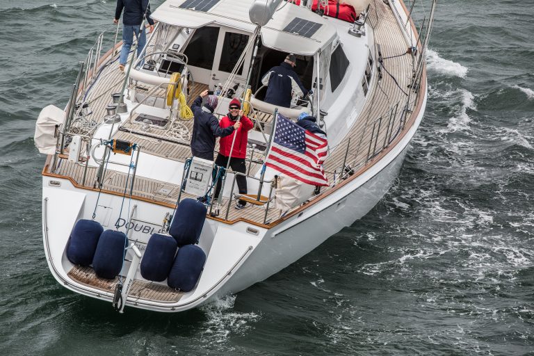 That's me in the red jacket smiling for the aerial video as the 78-foot Double X sloop sails under the Golden Gate Bridge All hands were on deck for the beginning of this adventure to the South Seas. San Francisco, Calif., July 16, 2016. Photo: C. Woods.