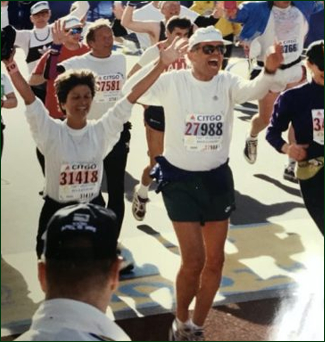 Dr Sam and his wife running a race together