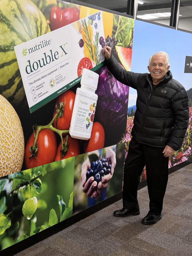 Dr. Sam with a Double X product display