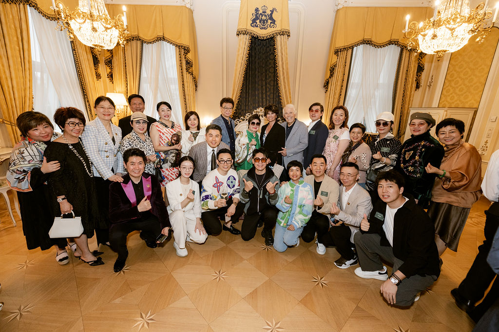 A large group of people standing together for a photo.